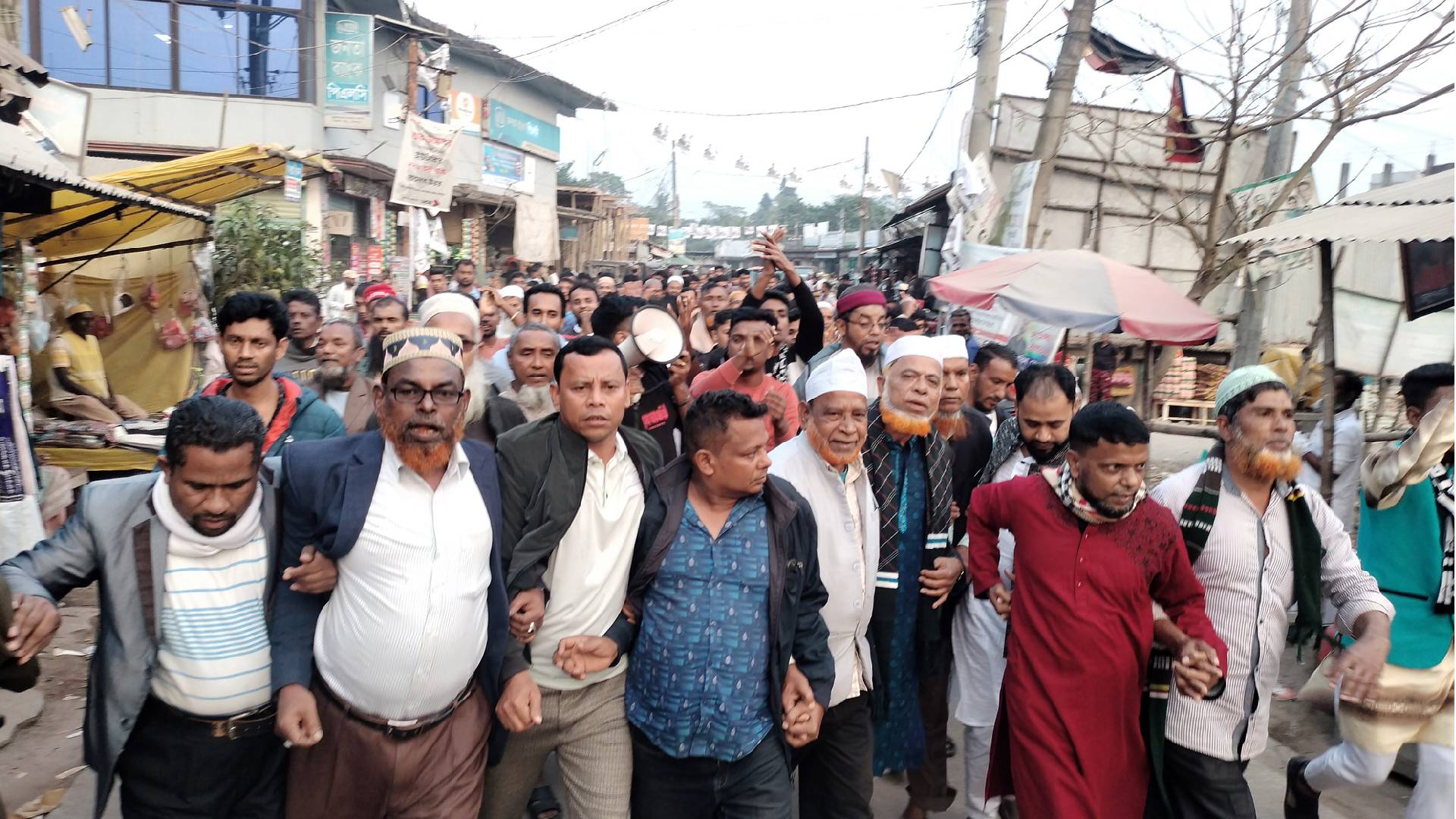 মতলব উত্তরে আদুরভিটি গ্রামবাসীর নৌকার পক্ষে মিছিল।